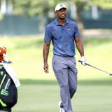 Tiger Woods struggles off tee, survives cut at Memorial