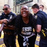 2 in custody after Black Lives Matter mural outside Trump Tower is again defaced