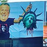 Artist puts up banner depicting NYC Mayor with Liberty's severed head