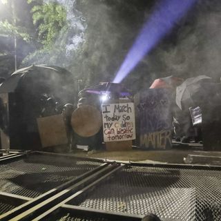 Portland protesters breach fence around federal courthouse