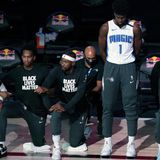 Jonathan Isaac responds after being the lone NBA player to stand for National Anthem | CNN