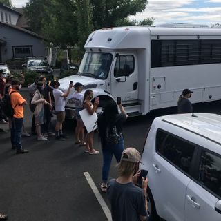 Central Oregonians stall ICE bus with impromptu protest