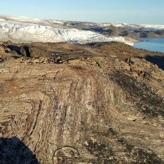 Building blocks for life on Earth arrived much later than we thought, billion-year-old rocks show