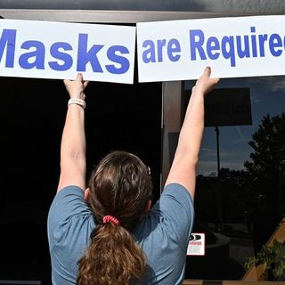 Some Georgia cities race to adopt mask mandates after Kemp’s about-face