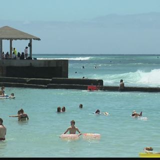 Thousands seen in the water on Day 1 of Labor Day weekend