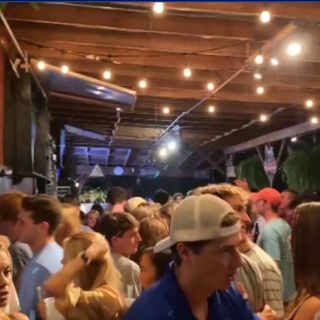 Students, residents react after video of large, maskless crowd at Columbia bar goes viral