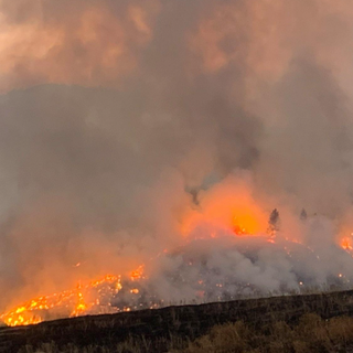 Large western Idaho fire jumps to Adams County, causes more evacuations