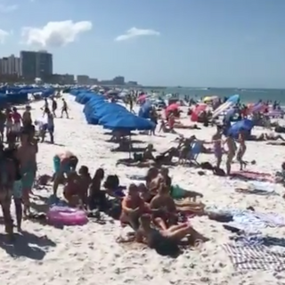 Thousands flock to Florida beaches, ignoring coronavirus concerns