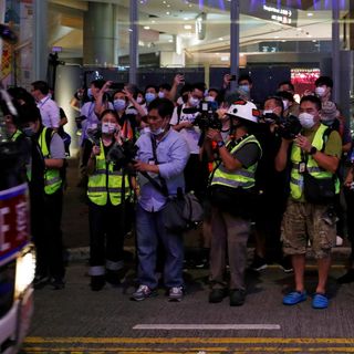 The Hong Kong police now get to decide who’s a member of the press