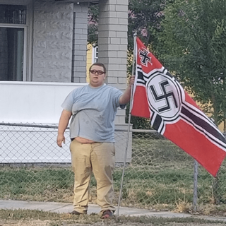 How an ordinary fellow with a NAZI flag can go viral and not in a good way: pathetic or evil?