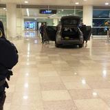 Car smashes through airport as two men 'shout Islamist slogans'