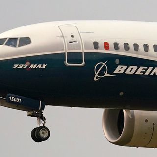 Boeing says pandemic will cut demand for planes for a decade