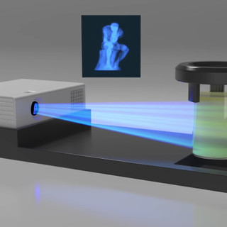 This light-powered 3D printer materializes objects all at once