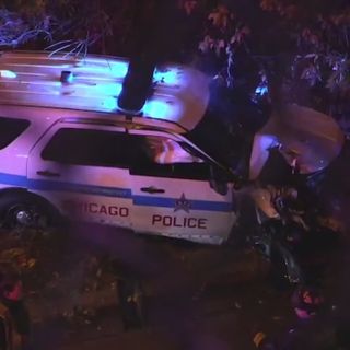 CPD vehicle crashes, falls 25 feet off overpass onto Kennedy Expressway