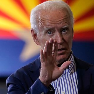 Biden, Kelly hold their leads in a new poll that points to Democratic edge in Arizona