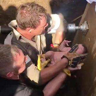 A passerby heard a newborn crying in a storm drain. Four hours later, she was rescued. | CNN