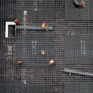 AI that scans a construction site can spot when things are falling behind