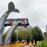 Whale of a ride: Crashed subway train lands on giant sea creature sculpture | CNN