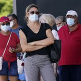 Polling places are latest front in battle over face masks