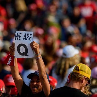 QAnon’s danger rises with divisive election