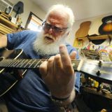 Inside a wooden ‘palace’ in Unity, Maine man builds guitars