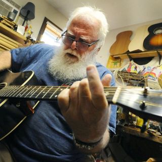 Inside a wooden ‘palace’ in Unity, Maine man builds guitars