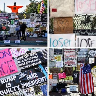 White House security fence covered in 'loser' and 'time to go' signs