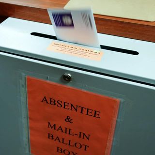 Postal worker recanted allegations of ballot tampering, officials say