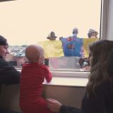 Fire departments surprise their colleague's four-year-old son battling cancer