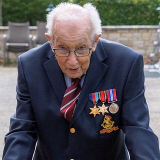 A 99-year-old veteran raises $15 million for UK health-care workers by walking round his backyard