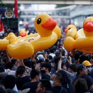 Why Thai students use rubber ducks, dinosaurs and three-finger salutes as protest symbols - ABC News