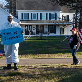 Dozens protest outside Sununu's home over mask requirement