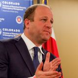 Each Colorado coronavirus patient is spreading the disease to as many as 4 people, governor says