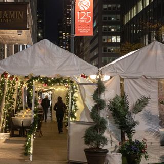 NYC steakhouse seared over outdoor dining setup