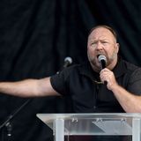 Biden ‘will be removed one way or another,’ Alex Jones tells pro-Trump rally