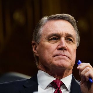 David Perdue sold his home to a finance industry official whose organization was lobbying the Senate