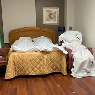 Photos show bodies piled up and stored in vacant rooms at Detroit hospital