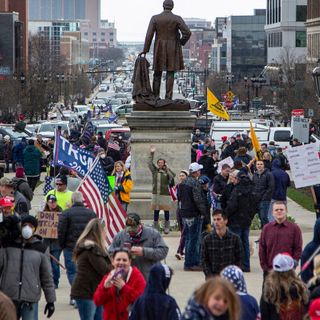 Thousands converge on Lansing to protest Whitmer's stay home order