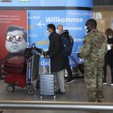 Air travel hits pandemic record amid surging infections and hospitalizations