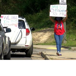 Dozens rally outside Richmond jail demanding release of inmates