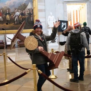 Florida man photographed carrying Pelosi’s lectern at U.S. Capitol riot arrested - National | Globalnews.ca