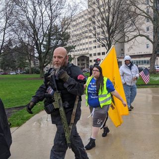 Michigan bans open guns at Capitol, nearly a year after armed protest