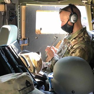 National Guardsman holds music classes from the back of a Humvee while protecting the US Capitol | CNN