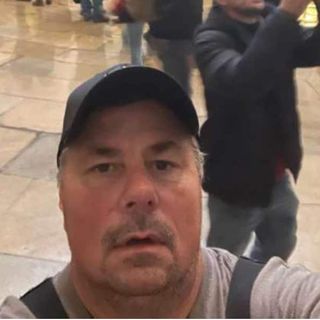 A man sent his girlfriend’s brother a selfie while storming the Capitol, officials say. The brother is a federal agent.