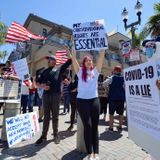 Scores gather in Huntington Beach to protest coronavirus stay-at-home orders