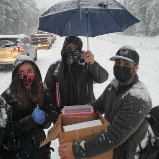 US healthcare workers stuck in snowstorm with expiring vaccines give shots to stranded drivers