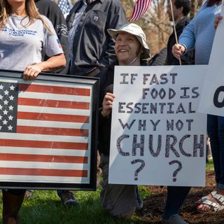 Protesters rally outside Governor's Residence to say Holcomb's orders go too far