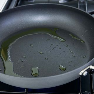 Physicists finally figured out why food sticks to a frying pan