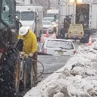 Sinkhole opens on Philadelphia street amid water break, swallows SUV