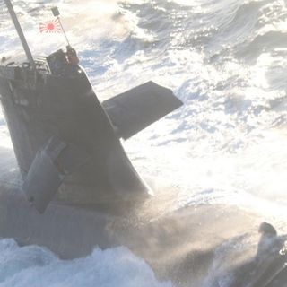 Japanese submarine collides with commercial ship while surfacing in Pacific